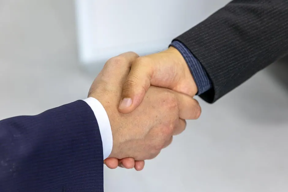 Een handdruk tussen een leverancier en eigenaar