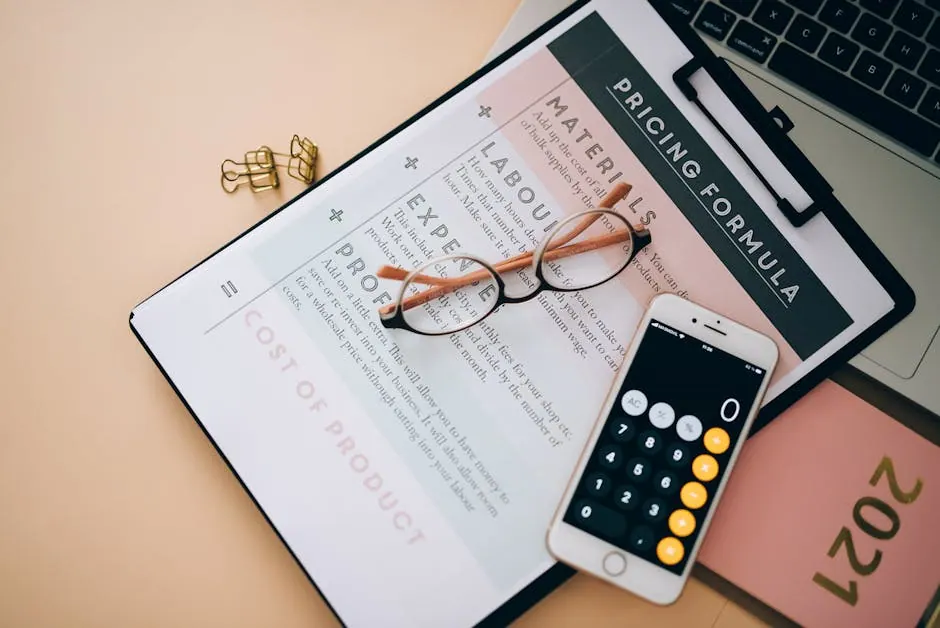 Calculator en prijslijsten op een bureau